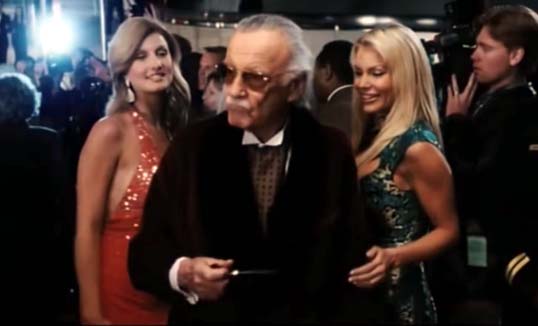 Iron man Stan Lee appeared as a bad ass old man surrounded with three beautiful blondes